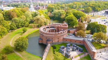Russia, Kaliningrad. Fortress tower dating from the mid-nineteenth century. Located in the center of Kaliningrad on the Verkhneye Lake shore, From Drone  clipart