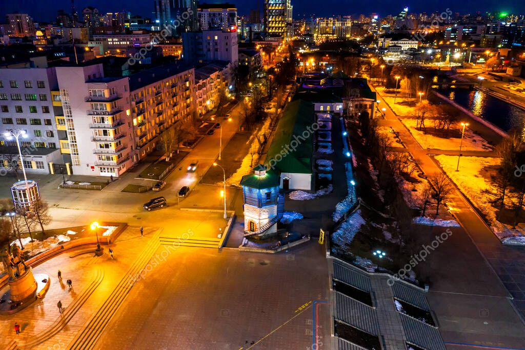 Yekaterinburg, Russia. Old water tower. One of the attractions of the city. Night city in the early spring. Aerial View
