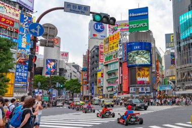 Shibuya, Tokyo, Japan - April 30, 2019: Mario kart on Shibuya district in Tokyo, Japan. Shibuya Crossing is one of the busiest crosswalks in the world.