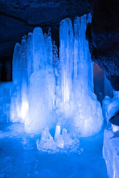 Wind Cave & Ice Cave in Fugaku Japan. The Fuji Fugaku Wind Cave is surrounded by the abundant greenery of the Aokigahara Jukai forest. Once you enter the cave, it is pleasantly cool even in summer