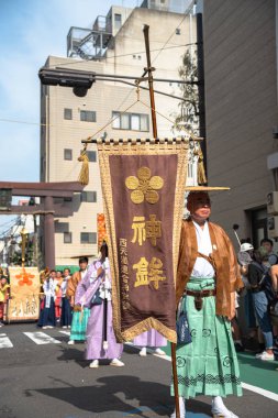 Osaka, Japonya - 25 Temmuz 2018 : Bin katılımcı ve seyircili Tenjin Osaka Festivali. Kyoto'nun Gion Matsuri'si ve Tokyo'nun Kanda Matsuri'si ile birlikte Japonya'daki en iyi üç festival