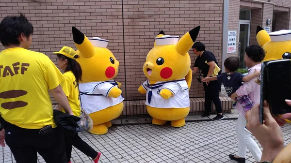 Yokohama, Japonya - 09 Ağustos 2017: Pikachu Salgını! 2017. Pokmon Company tarafından Japonya'nın Yokohama Minato Mirai 21 bölgesinde 9-15 Ağustos 2017 tarihleri arasında düzenlenen gerçek dünya etkinliği