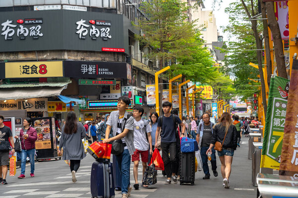 Taipei, Taiwan - April 15, 2019 : Ximending street market in Wanhua district, Taipei. A popular district in Taiwan, People visit for foods, shops, movie, fashion, cafes, restaurants.