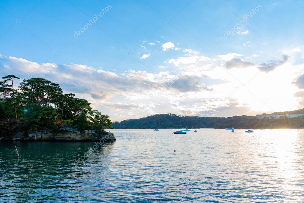 Matsushima Bay in dusk, beautiful islands covered with pine trees and rocks. One of the Three Views of Japan, and is also the site of the Zuigan-ji, Entsu-in and Kanrantei. in Miyagi Prefecture, Japan