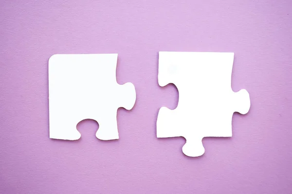 Two Puzzle Pieces Pink Background Symbol Autism Awareness — Stock Photo, Image