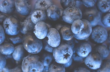 Lezzetli taze çekilmiş bluberry arka plan. Sağlıklı gıda kavramı.