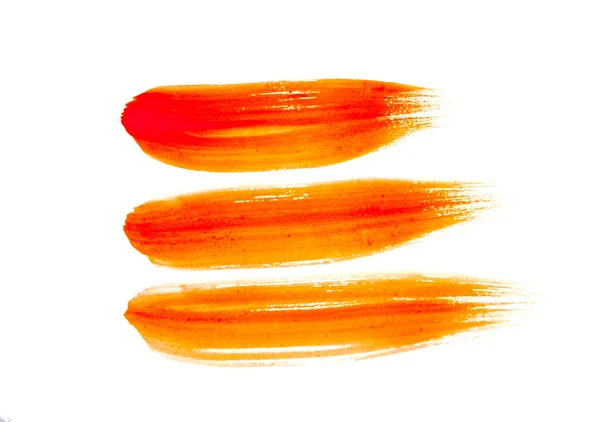 白い背景に分離されたオレンジ色のペイント ストローク — ストック写真
