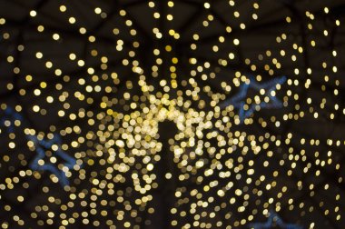 Küçük ışıklar ile arka plan bulanık. Parti konsept.