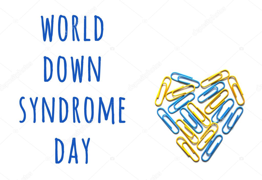 World down syndrome awareness concept with colorful heart.