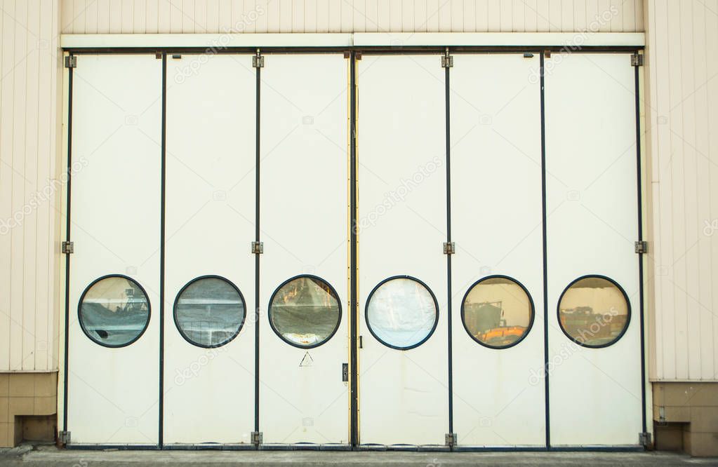 Doors with round shape windows.