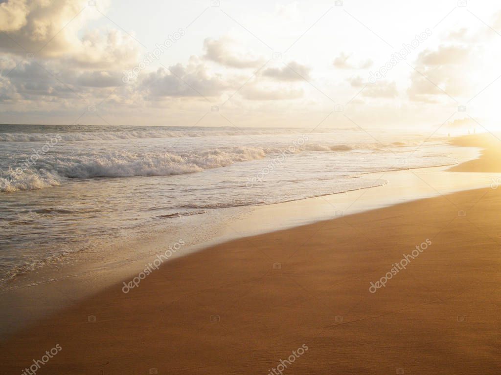 Soft waves of the ocean. Galle beach with amazing sunset, Sri Lanka