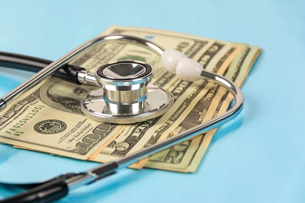 Stethoscope Money Dollar Blue Background Medical Concept — Stock Photo, Image
