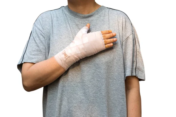 Bandage élastique enveloppé à la main après le doigt de déclenchement percutané r — Photo