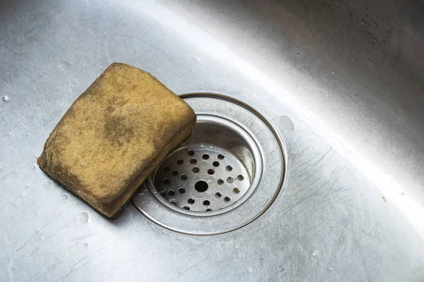 Old scrub sponge in a sink ,Old Kitchen Sponge Could Give Diarrh — Stock Photo, Image