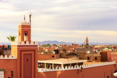 Minaret tower on the historical walled city (medina) in Marrakech. Morocco clipart