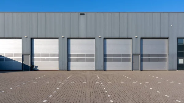 Row Grey Industrial Units Roller Shutter Doors — Stock Photo, Image