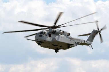 BERLIN - APR 27, 2018: New Sikorsky CH-53K King Stallion heavy-lift helicopter of the US Marines in action at the Berlin ILA Air Show. clipart