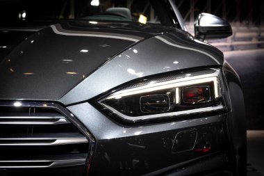 BRUSSELS - JAN 19, 2017: Close up of the new Audi S5 car showcased at the Motor Show Brussels. clipart
