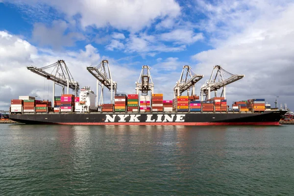 Nyk Line container ship is being loaded by cranes in the Port of — Stock Photo, Image