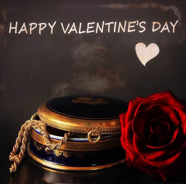 Happy Valentine\'s day with a jewelry ancient box and a gorgeous red rose