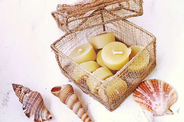 Still Life Beeswax Candles Gold Wire Mesh Box Sea Shells — Stock Photo, Image