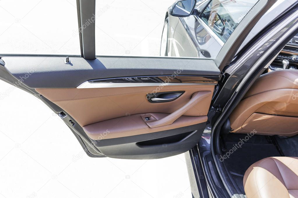 Back Passenger Seat and Door of Luxury Car.