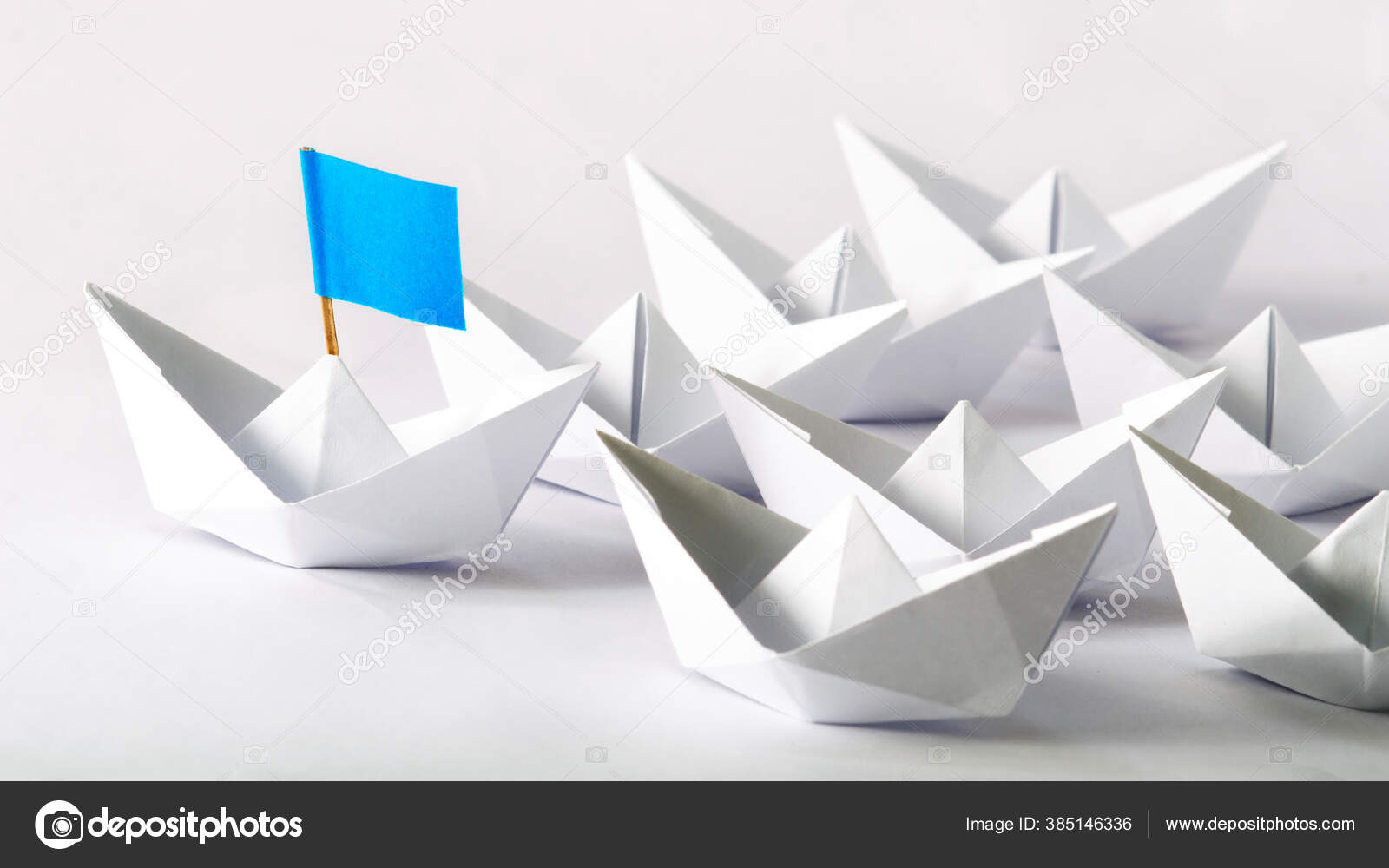 Leadership Concept Blue Flag Origami White Paper Boat Ship Leading — Stock  Photo © shorabkareem@gmail.com #385146336, image size:1600x1000
