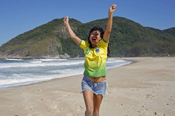 Woman celebrating goal in soccer Brazil