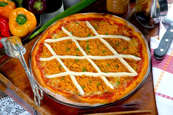 Cheese and chicken pizza,