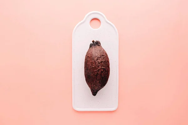Vaina Cacao Sobre Fondo Rosa Creativo Concepto Comida Laica Plana —  Fotos de Stock
