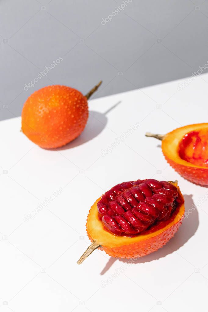 Gac fruit on a white background, creative food concept
