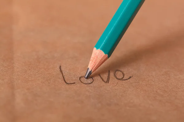 Pencil Writes Word Love Paper — Stock Photo, Image