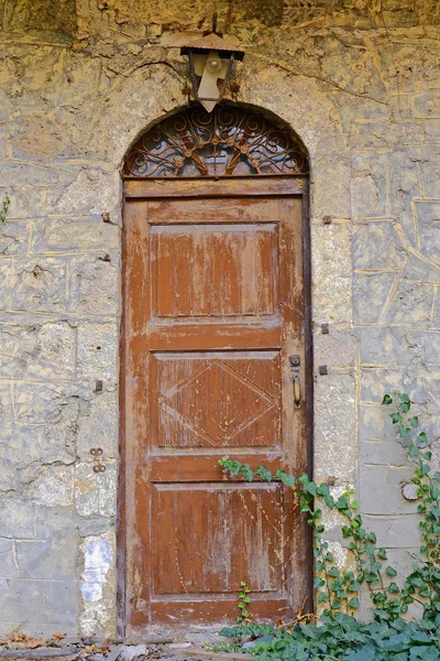 Vintage Brown Arched Door Stone Wall — Stock Photo, Image