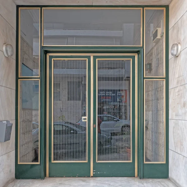 Greece Athens Downtown Elegant Condominium Entrance Metallic Green Frame Door — стоковое фото