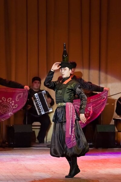 Georgian National Ballet Sukhishvili, world famous dancers, dance with a bottle at concert in Vinnytsia, Ukraine, 25.02.2012