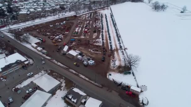 Vista Aérea Cómo Prepararse Para Una Venta Lodo Invierno Amish — Vídeo de stock