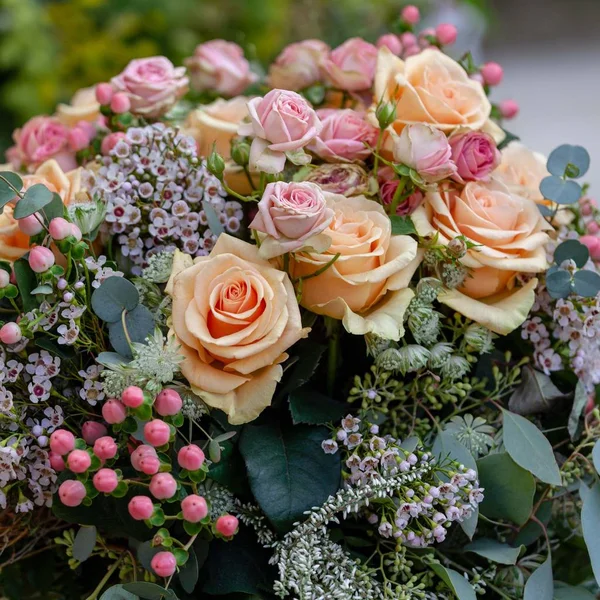 Bouquet of peach and pink roses