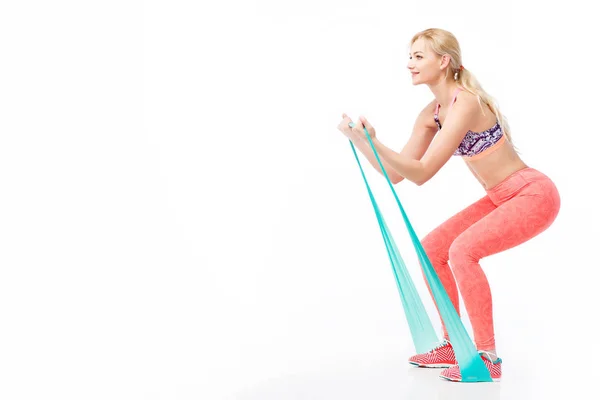 Genç güzel kadın egzersizleri streç şeritli uygun.
