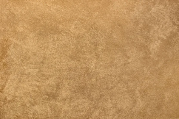 Foto einer alten goldenen Zementwand mit Brüchen. Textur für Muster. — Stockfoto