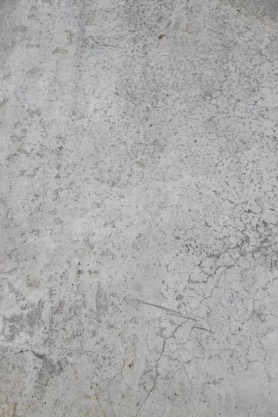 çatlaklar ile eski beton duvar.