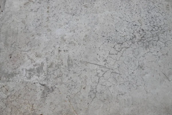 çatlaklar ile eski beton duvar.