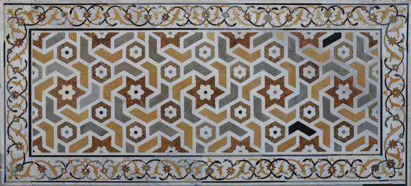 Marble grilles and floors decorated with national ornament in the interior of the temples of India. The pattern is striking in its unique beauty, while at the same time being simple.