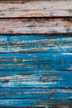 Dikey görüntü yontma ve alıntı mavi boya ile yıpranmış ahşap plakalar