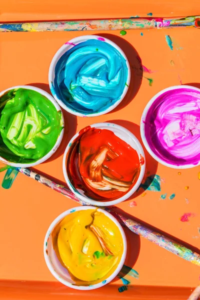 Colorful Paints Sit In Bowls For Kids To Paint With — Stock Photo, Image