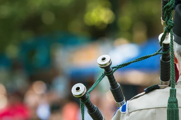 Closeup Of Bagpipes Resting Against Shoulder As Man Plays Instrument — Stock Photo, Image