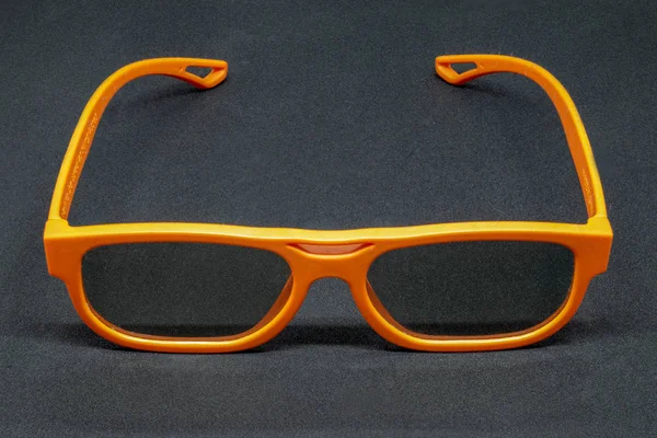 Orange Dimensional Glasses Dark Grey Background — Stock Photo, Image