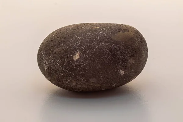 Round stone isolated on a white background — Stock Photo, Image
