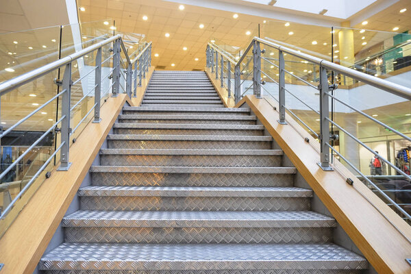 stairs of the shopping center. in a modern shopping complex.