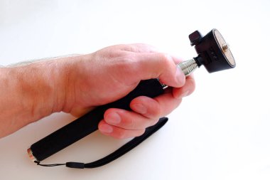 Teleskopik monopod fotoğraf için. Siyah kauçuk kulplu gümüş. Yandan ip.
