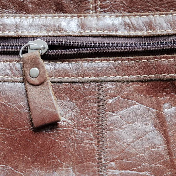 Zip on a leather bag. Close up